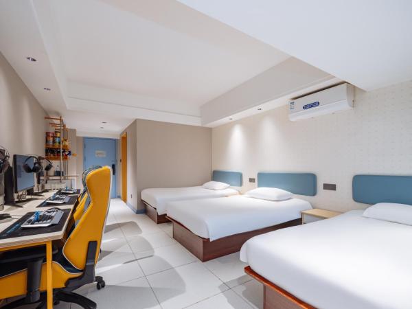 网鱼电竞酒店(竹山路地铁站店) : photo 3 de la chambre chambre triple
