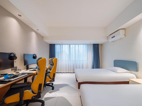 网鱼电竞酒店(竹山路地铁站店) : photo 5 de la chambre chambre lits jumeaux