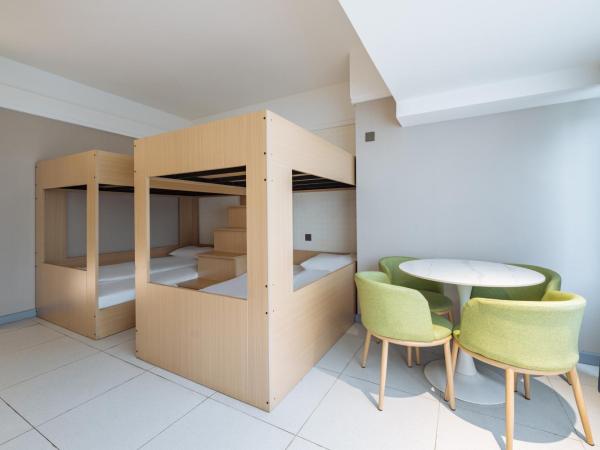 网鱼电竞酒店(竹山路地铁站店) : photo 5 de la chambre chambre quadruple