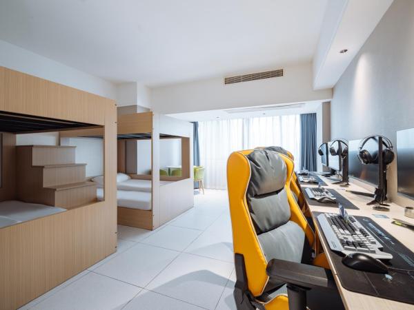 网鱼电竞酒店(竹山路地铁站店) : photo 6 de la chambre chambre quadruple