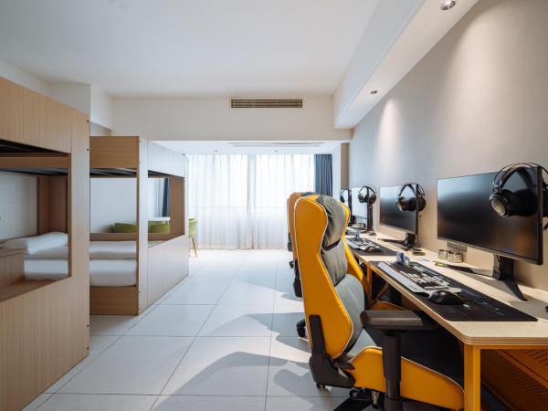 网鱼电竞酒店(竹山路地铁站店) : photo 7 de la chambre chambre quadruple