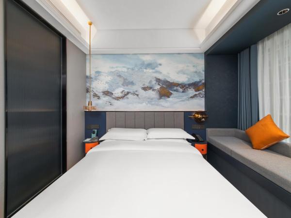 R ROYALSS HOTE Qujiang Dayan Pagoda : photo 1 de la chambre chambre double