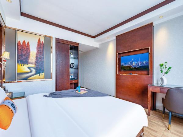 Henghe Selected S Design Hotel - flagship store of Guangzhou Baiyun Railway Station International Convention Center : photo 2 de la chambre chambre lit queen-size deluxe