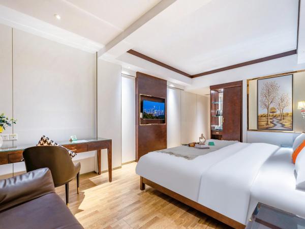 Henghe Selected S Design Hotel - flagship store of Guangzhou Baiyun Railway Station International Convention Center : photo 2 de la chambre chambre lit king-size deluxe