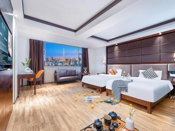 Henghe Selected S Design Hotel - flagship store of Guangzhou Baiyun Railway Station International Convention Center : photo 1 de la chambre executive city view twin room