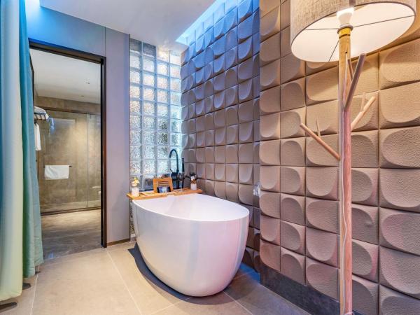 Henghe Selected S Design Hotel - flagship store of Guangzhou Baiyun Railway Station International Convention Center : photo 2 de la chambre superior queen room with bath 