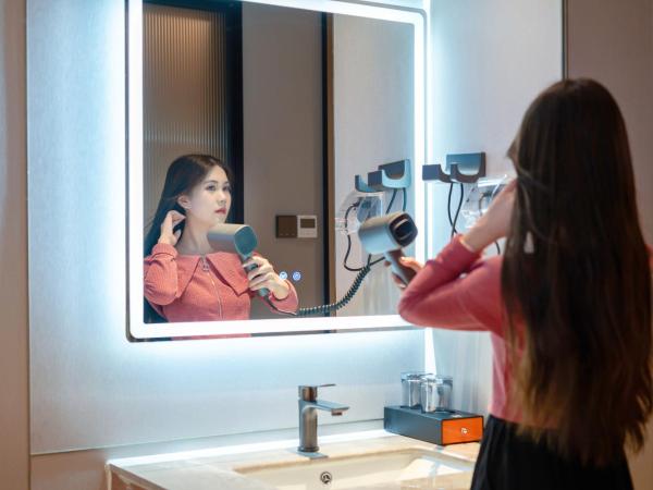 Henghe Selected S Design Hotel - flagship store of Guangzhou Baiyun Railway Station International Convention Center : photo 4 de la chambre guest twin room 
