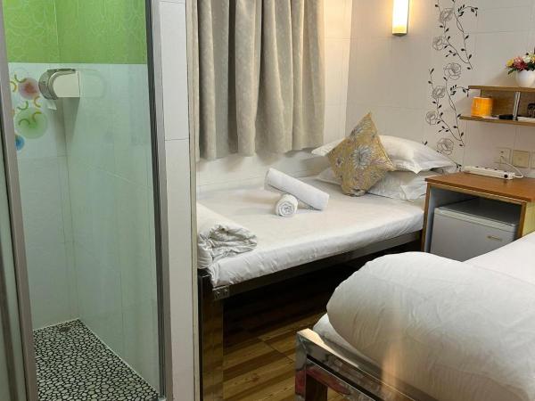 Holiday Guest House : photo 3 de la chambre chambre triple deluxe