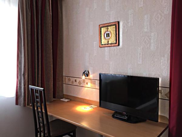 Hotel Saint-Aignan : photo 10 de la chambre chambre quadruple