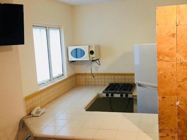 Angeles Suites & Hotel : photo 3 de la chambre suite 2 chambres