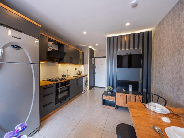 Mrt Suites Lara : photo 6 de la chambre suite deluxe avec baignoire spa