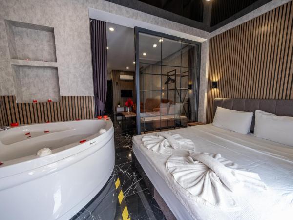 Mrt Suites Lara : photo 1 de la chambre suite avec jacuzzi