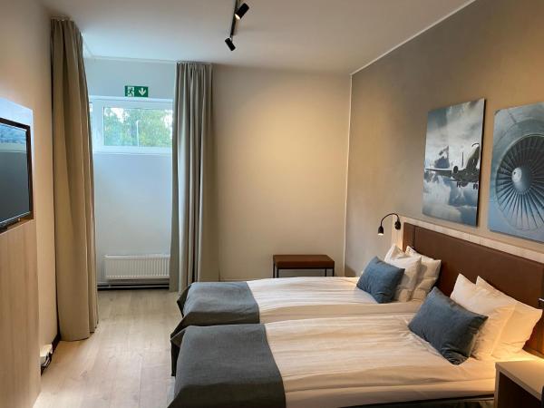 Pilot Airport Hotel : photo 5 de la chambre chambre lits jumeaux confort
