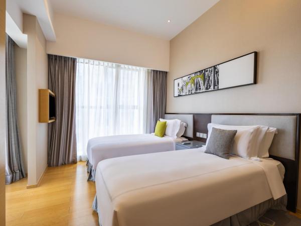 CM Service Apartment Tianjin : photo 3 de la chambre appartement 3 chambres