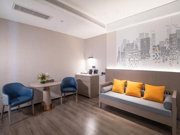 Mehood Hotel Xi'an High-tech Software New City International Conference Center : photo 4 de la chambre double room with movie