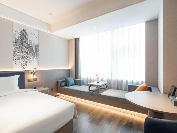 Mehood Hotel Xi'an High-tech Software New City International Conference Center : photo 2 de la chambre chambre affaires lits jumeaux