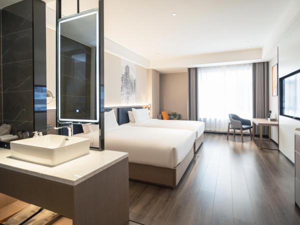 Mehood Hotel Xi'an High-tech Software New City International Conference Center : photo 3 de la chambre chambre affaires lits jumeaux