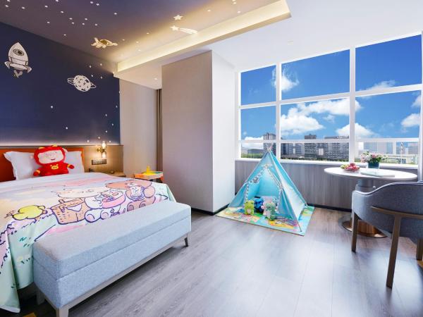 Mehood Hotel Xi'an High-tech Software New City International Conference Center : photo 3 de la chambre chambre familiale