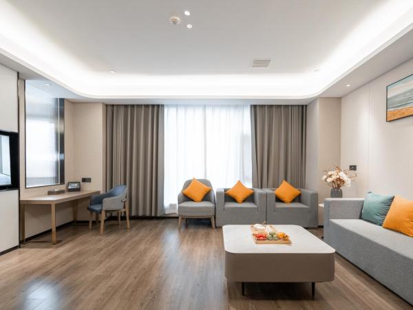 Mehood Hotel Xi'an High-tech Software New City International Conference Center : photo 4 de la chambre suite affaires