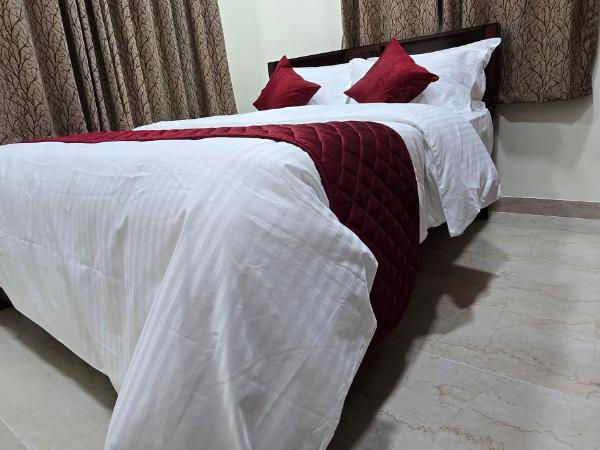 Hotel NJ Residency : photo 10 de la chambre chambre lit queen-size deluxe