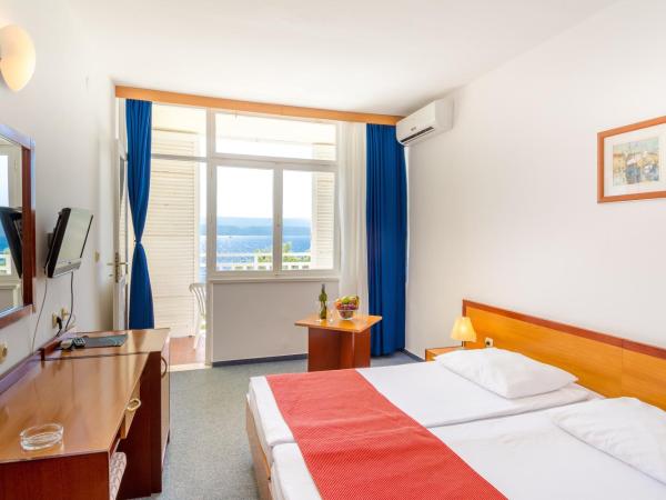 Holiday Village Sagitta - Light All Inclusive : photo 3 de la chambre chambre double ou lits jumeaux avec balcon - vue latérale sur mer