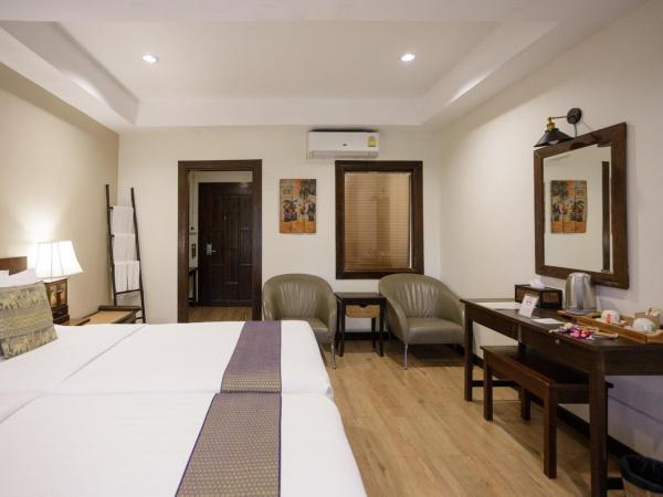 Lanna Dusita Riverside Boutique Resort : photo 8 de la chambre  chambre double ou lits jumeaux supérieure - vue sur jardin