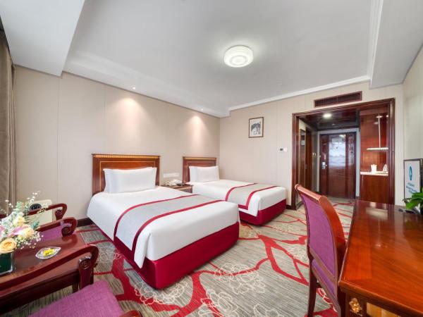 Hangzhou Haiwaihai Communication Hotel : photo 2 de la chambre chambre lits jumeaux supérieure