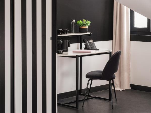 Maisons du Monde Hôtel & Suites - La Rochelle Vieux Port : photo 5 de la chambre suite junior