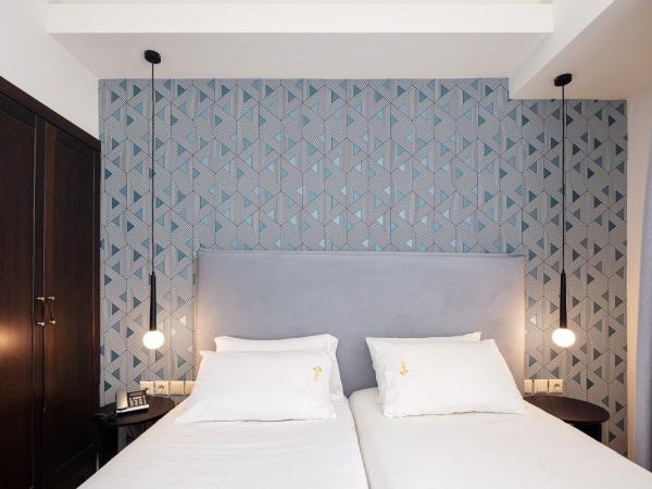 Steris Elegant Beach Hotel & Apartments : photo 6 de la chambre appartement avec vue latérale sur la mer