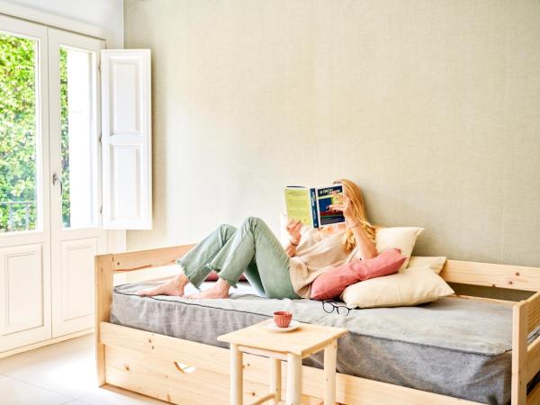 Eco Boutique Hostal Grau : photo 2 de la chambre studio familial avec kitchenette