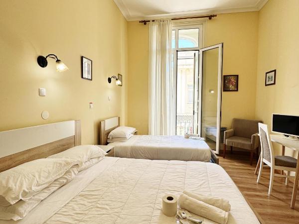 Central Guest House : photo 1 de la chambre chambre triple