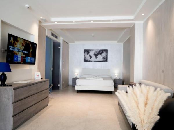 Catania Sea Palace Hotel : photo 5 de la chambre suite lit king-size avec baignoire spa