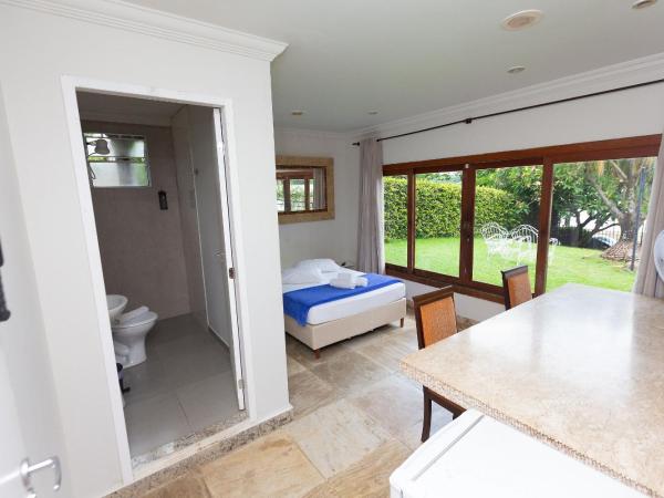 Pousada Wafeh Pampulha Suítes : photo 5 de la chambre suite avec vue sur lac 