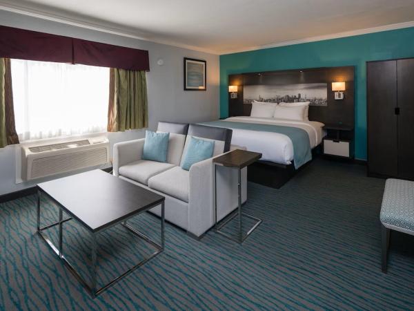 Inn On Grove : photo 1 de la chambre chambre lit king-size avec baignoire spa