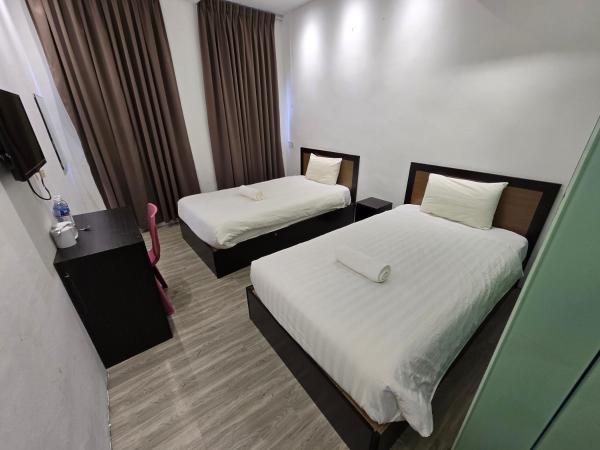 One Point Hotel @ King Centre : photo 1 de la chambre chambre lits jumeaux standard