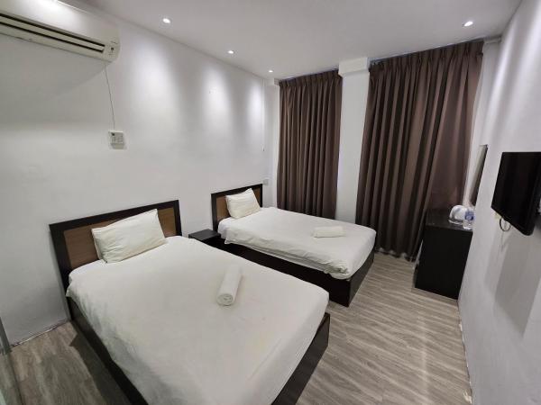 One Point Hotel @ King Centre : photo 2 de la chambre chambre lits jumeaux standard