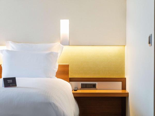 Pullman Eindhoven Cocagne : photo 1 de la chambre chambre lits jumeaux supérieure