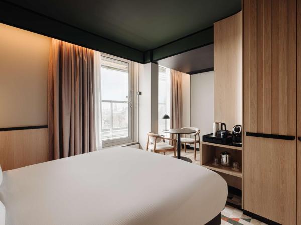 DoubleTree by Hilton Amsterdam Centraal Station : photo 3 de la chambre chambre de luxe avec balcon - vue sur ville