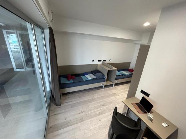 Hostelum : photo 9 de la chambre chambre quadruple
