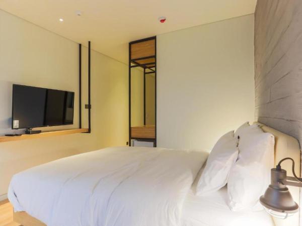 H Avenue Hotel Dongdaemun Sungshin : photo 1 de la chambre suite lit queen-size