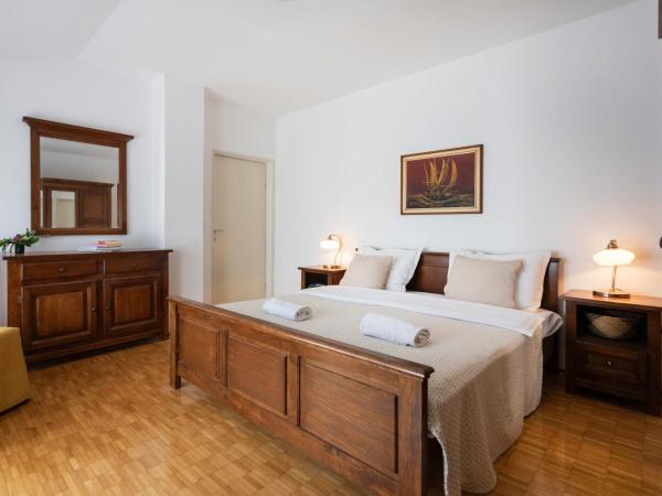 Poolside Stone Residences - Marina Bok : photo 6 de la chambre appartement 2 chambres avec balcon et terrasse