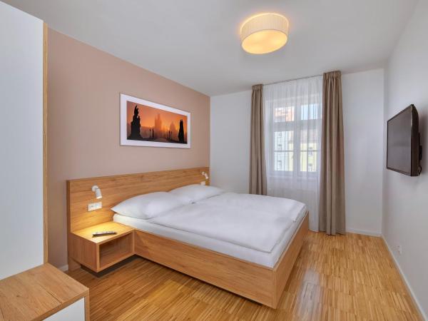 Downtown Suites Kodanska : photo 4 de la chambre hébergement quadruple 2 chambres