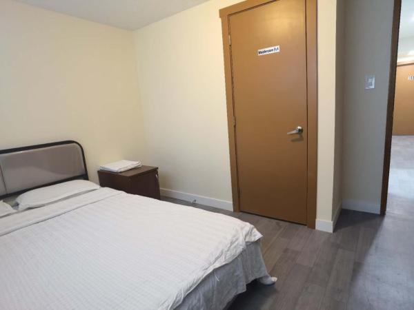 卡城如家家庭旅馆6号店 : photo 7 de la chambre chambre double avec salle de bains privative