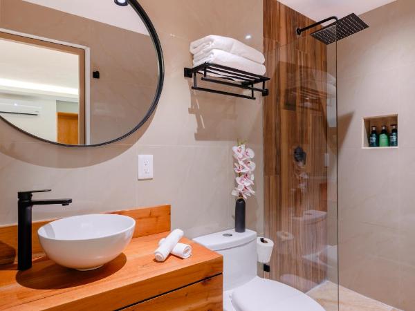 Coralia Boutique Hotel Cozumel : photo 6 de la chambre suite lit queen-size