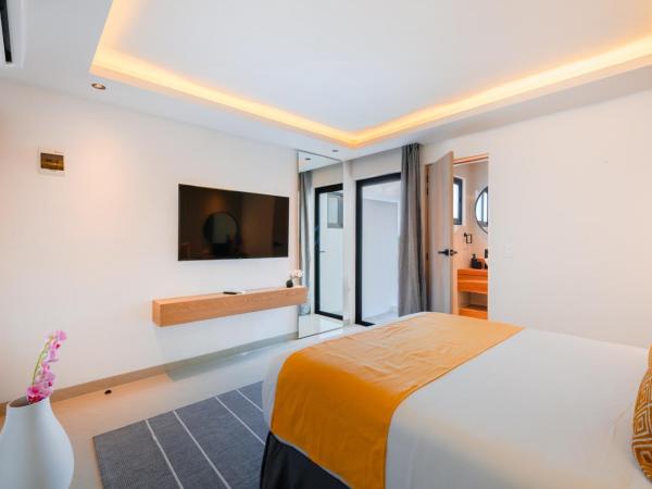 Coralia Boutique Hotel Cozumel : photo 4 de la chambre chambre standard lit queen-size