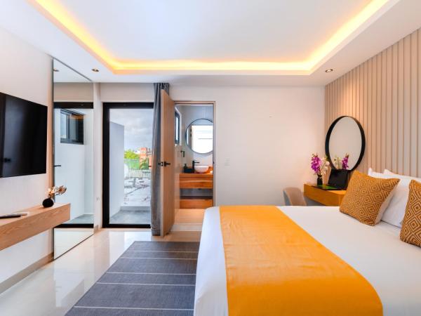 Coralia Boutique Hotel Cozumel : photo 1 de la chambre chambre standard lit queen-size