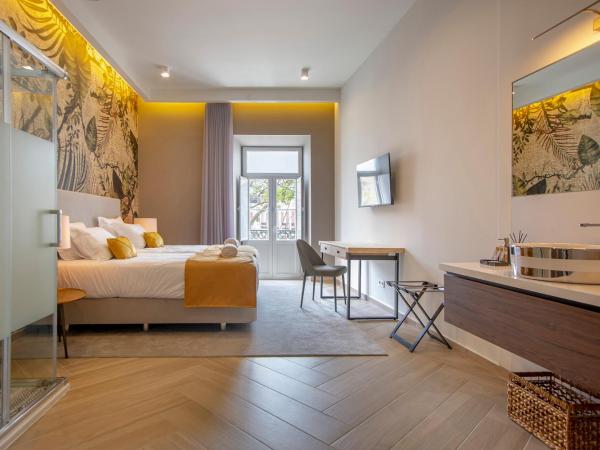 Guest House Jacarandá Faro : photo 6 de la chambre chambre lits jumeaux