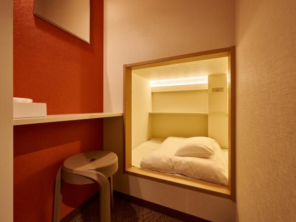 ホテルコンテニュー二条城北 : photo 2 de la chambre lit simple dans dortoir pour femmes