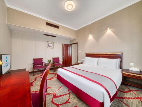 Hangzhou Haiwaihai Communication Hotel : photo 1 de la chambre chambre supérieure lit queen-size