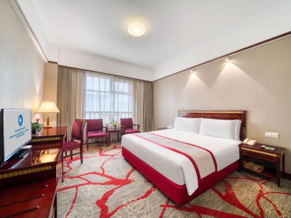 Hangzhou Haiwaihai Communication Hotel : photo 2 de la chambre chambre supérieure lit queen-size